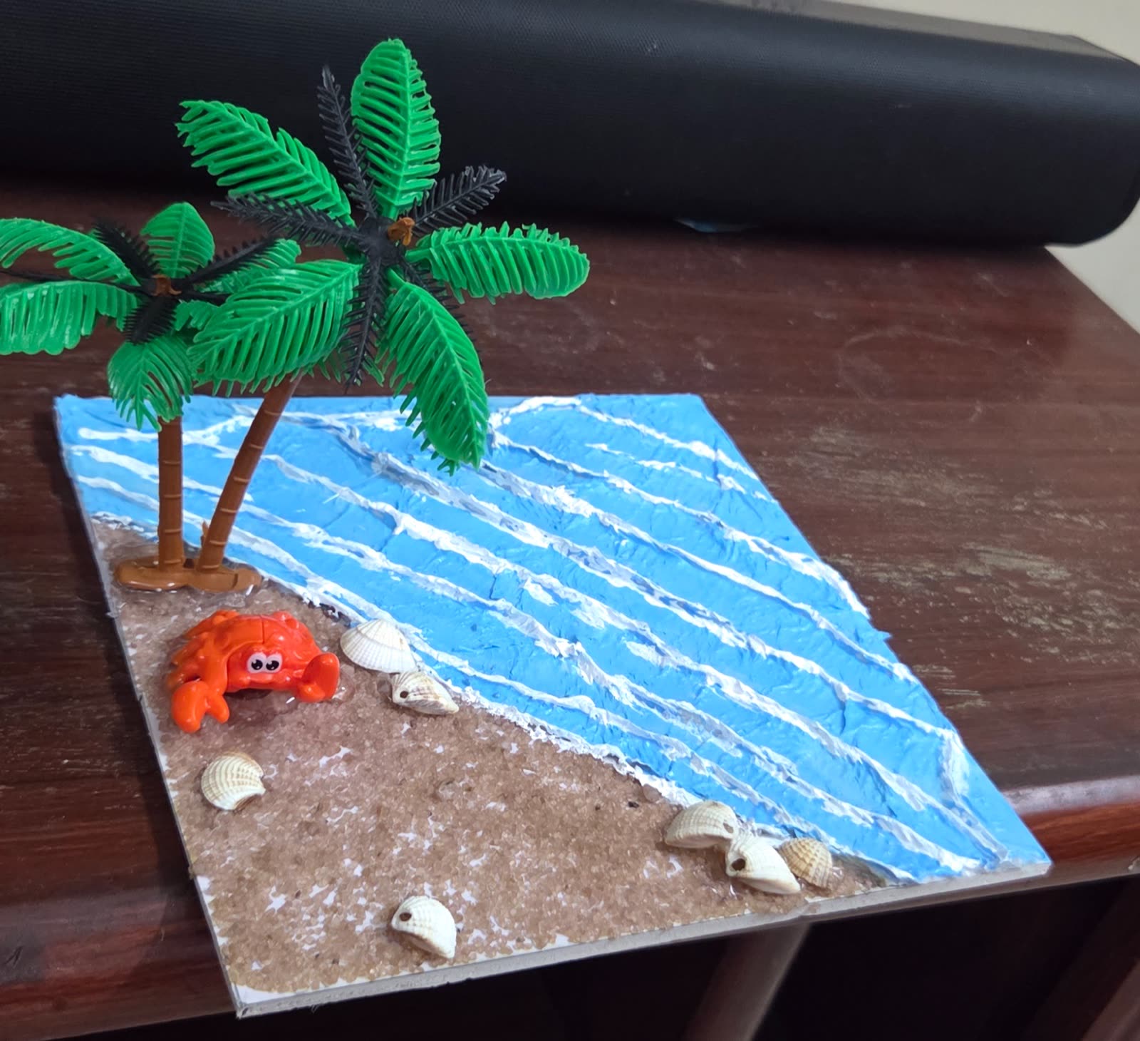 Ocean beach 3D model with textured waves, seashells, palm tree and crab