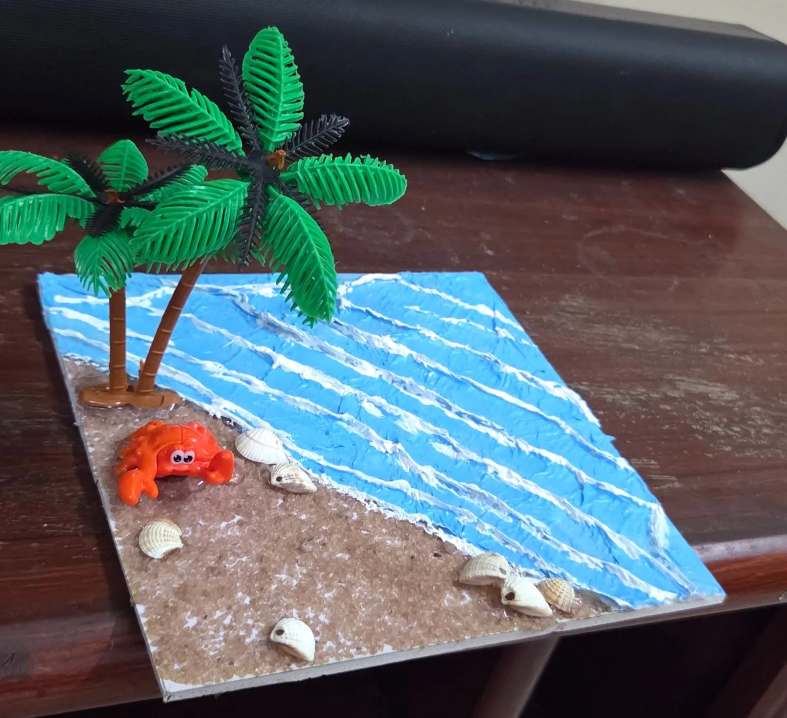 Ocean beach 3D model with textured waves, seashells, palm tree and crab